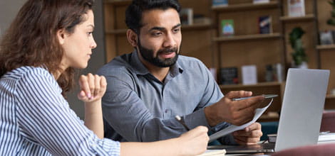 Doctor explaining to junior colleague